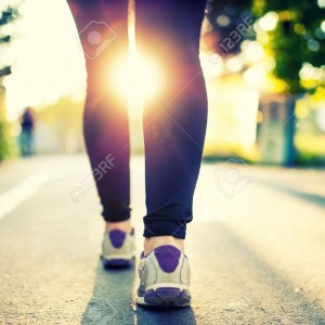 28283250-close-up-of-woman-athlete-feet-and-shoes-while-running-in-park-fitness-concept-and-welfare-with-fema2